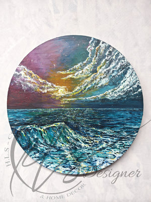 Original painting by Hannah Singleton owner and artist behind HLSdesigner. Based in Cornwall and taking inspiration from the ocean around her. This painting depicts a violet sunset in bold colours with a textured surface, over looking the calm ocean with a peak rising in the foreground of a lapping wave glistening the luminous spectrum of colours from the sun above, painted on a round canvas 