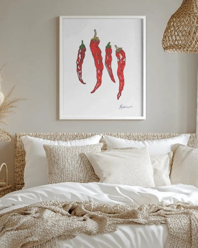 chillies illustration above a bed, wall art for the home, depicting heat and inspired by chef vegetable preparation and still life, a fun take on red hot peppers