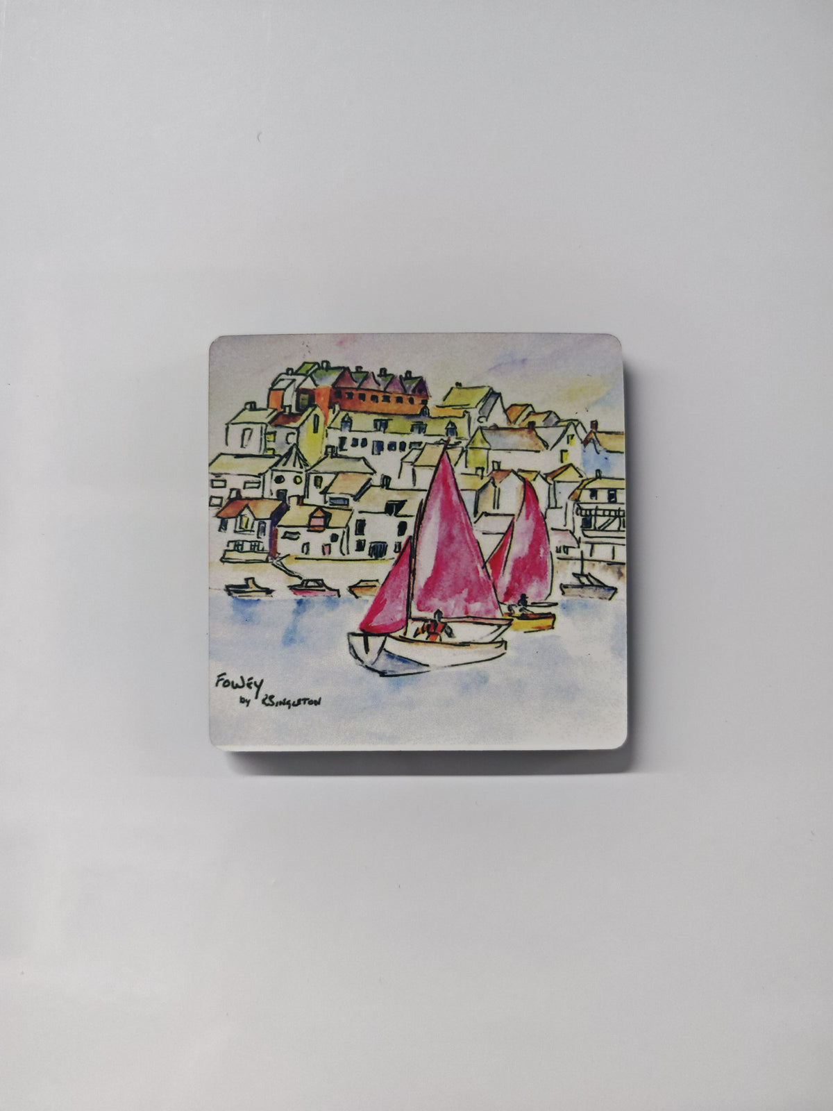 Watercolour reproduction print  a painting by R Singleton in cornwall. This one is a wooden magnet with a high gloss finish featuring an artist study of Fowey in Cornwall. Focusing on the yachts and the town above ascending up the hill beyond the river. 