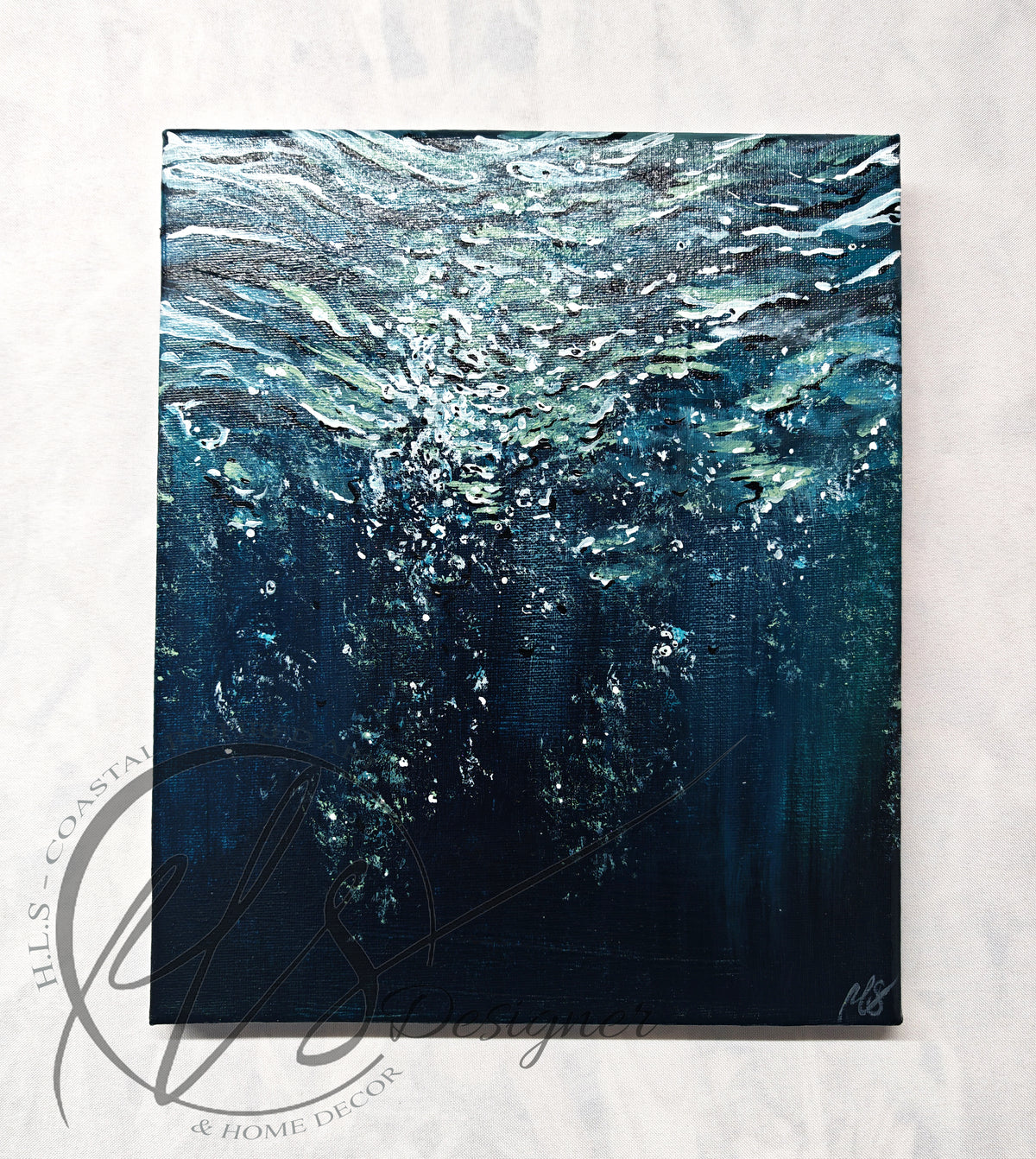 Seascape painter Hannah Singleton owner and artist behind HLSdesigner, creating underwater and close up water current paintings inspired by the surrounding coast. This painting is a deep blue and green hue under the sea. Imagine yourself under the water, light reflecting from the surface as you ascend to take a breath. highlights and shadows into the unknown. bubbles rising around you in a tranquil abyss. Original acrylic painting