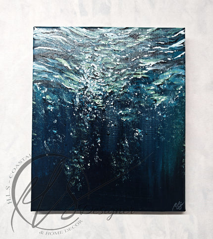 Seascape painter Hannah Singleton owner and artist behind HLSdesigner, creating underwater and close up water current paintings inspired by the surrounding coast. This painting is a deep blue and green hue under the sea. Imagine yourself under the water, light reflecting from the surface as you ascend to take a breath. highlights and shadows into the unknown. bubbles rising around you in a tranquil abyss. Original acrylic painting