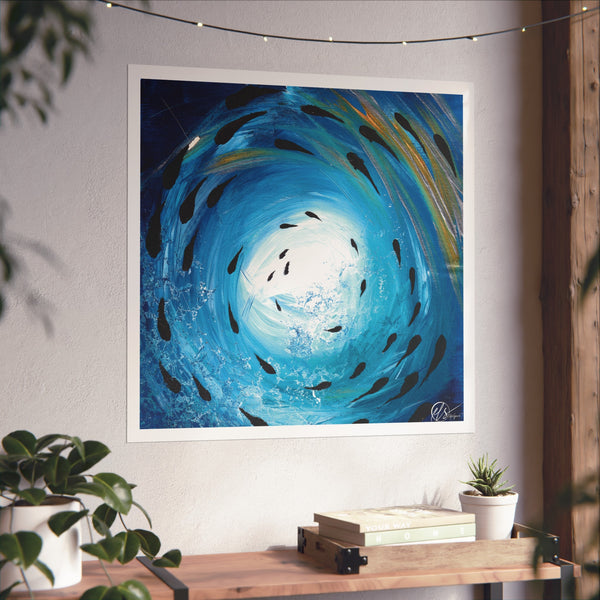 Abstract painting of swirling blue and green colours with gold accents and textures with black fish swimming under the sea - art print by hlsdesigner displayed on a wall with plants and books below.