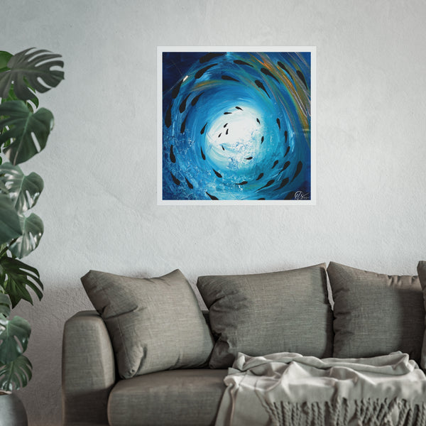 unframed artwork of a blue abstract design depicting a fish shoal swimming under the waves ocean surface in a tunnel vortex imagery by hlsdeisgner on a wall above a grey sofa.