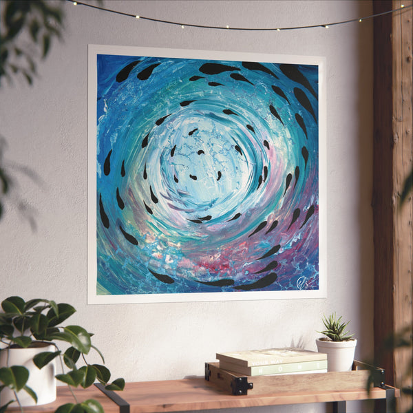 Abstract artwork with swirling colours depicting a fish shoal swimming amongst the waves in the vortex under the sea displayed on a wall above a wooden console table.