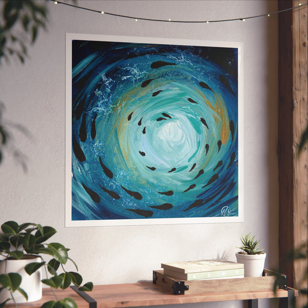 Abstract artwork with swirling blue and green colours depicting a shoal of fish swimming around the art print under the ocean surface with gold hues around it by hlsdesigner on a wall above a wooden console table.