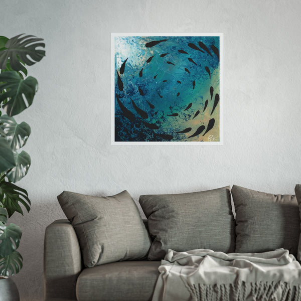 Unframed abstract artwork with black fish shoal swimming under the ocean with textured fractals showing the waves under the sea displayed on a wall above a sofa with a plant to the left. HLSdesigner