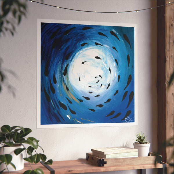Unframed abstract artwork with swirling blue and white design of a fish shoal swimming under the ocean surface with gold hue and white light reflecting down from the surface by hlsdesigner on a wall above a wooden shelf.