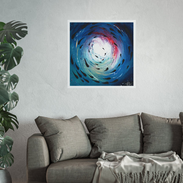 Abstract artwork on a wall above a sofa with a plant to the left. fish shoal swimming around the art print under the sea with red hues from a sunset above the waters surface shining through into the water. Art by HLSdesigner