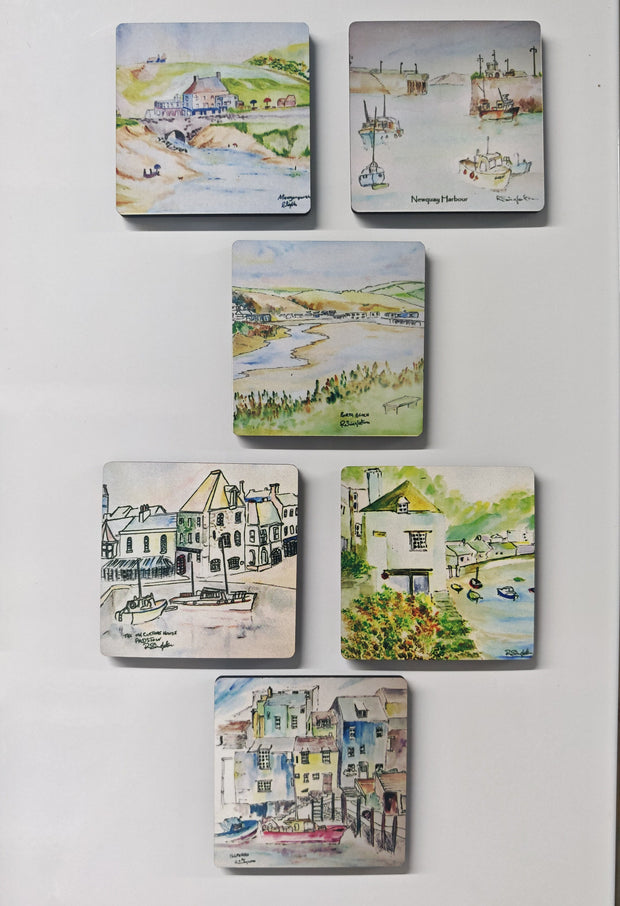 A set of square magnets featuring colourful watercolour and sketch illustrations of coastal landscapes, boats, and seaside buildings, displayed on a white wall. Cornwall tons and beaches painted by R Singleton and reproduced into magnets exclusively at HLSdesigner in cornwall. This range features magnets of Polperro, padstow, Porth beach, Newquay and more