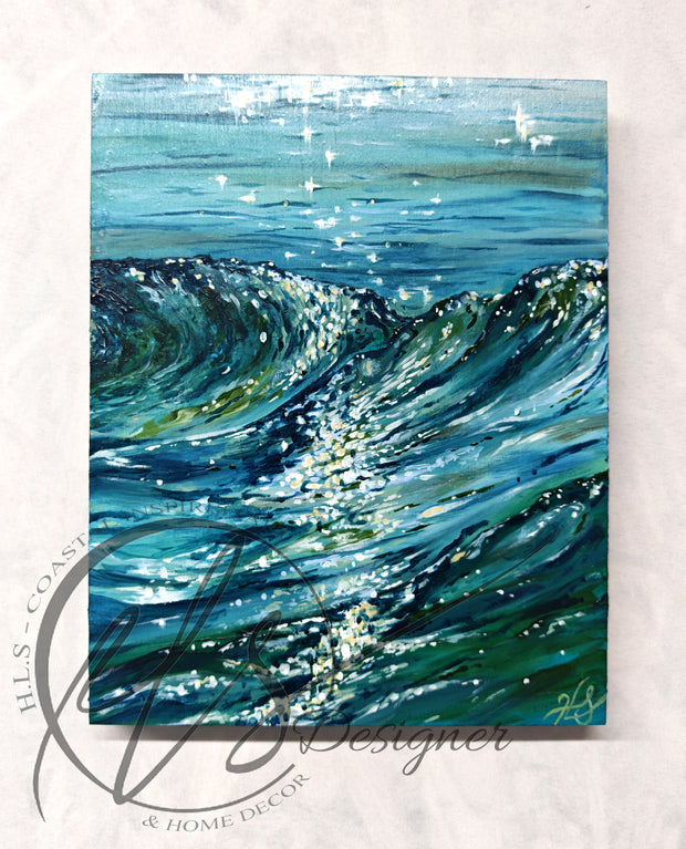 Seascape painting depicting a close up rolling wave as it rises but not et crashing, glistening light dances upon the surface of the ocean while pure green hues showcase the summer sun and stars flicker the reflections of the ocean behind. A beautiful painting inspired by the coast of Cornwall by Hannah Singleton. Fine artist and illustrator