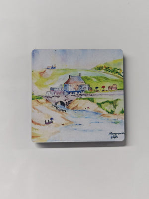 Mawgan Porth beach near Newquay in Cornwall - watercolour painting by R Singleton using colour washes and beautiful features to create an artist study of the Merrymoor Inn, the bridge and the stream coming through towards the ocean. with beach goers setting up for sunbathing and the green hills in the background. Fridge magnet made from wood and finished with a high gloss top. available as collectable souvenirs from Newquay and reproduced exclusively by HLSdesigner
