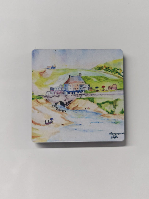 Mawgan Porth beach near Newquay in Cornwall - watercolour painting by R Singleton using colour washes and beautiful features to create an artist study of the Merrymoor Inn, the bridge and the stream coming through towards the ocean. with beach goers setting up for sunbathing and the green hills in the background. Fridge magnet made from wood and finished with a high gloss top. available as collectable souvenirs from Newquay and reproduced exclusively by HLSdesigner