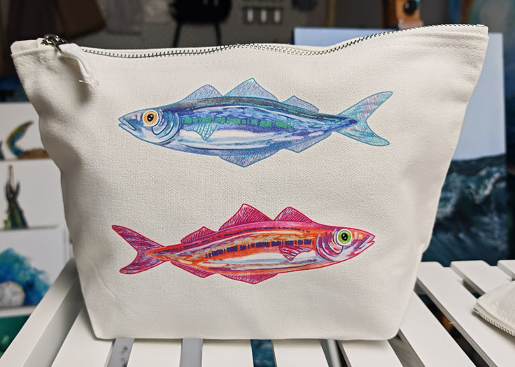 this is the medium sized sardines accessory bag featuring two sardines, one pink and orange and the other is blue and green, designed and pressed by hlsdesigner onto 100% brushed cotton canvas. Sponge clean only. accessory bag