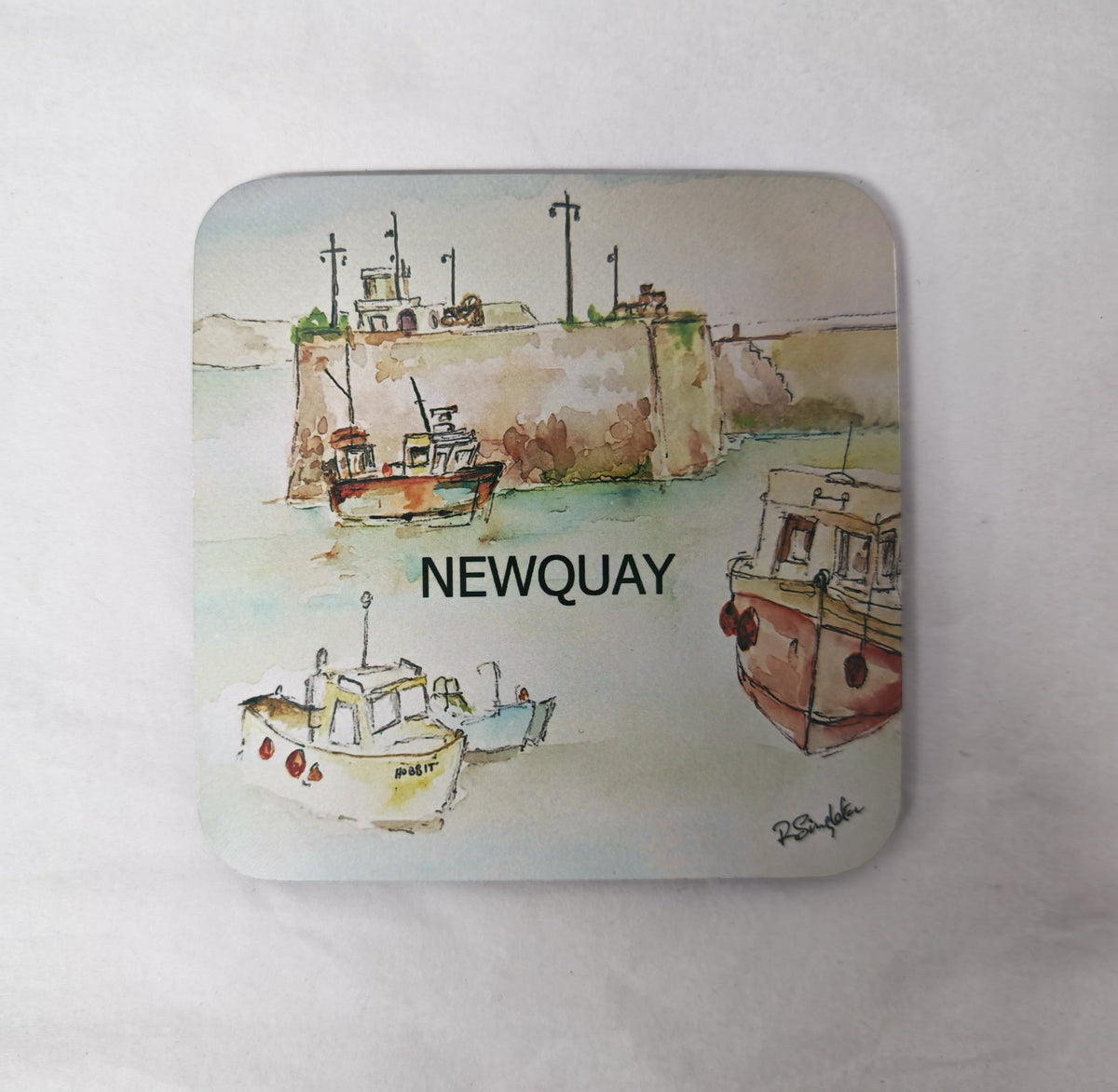 Newquay harbour cornwall coaster design printed from watercolour painting of Cornish scenes by R Singleton and hand printed by HLSdesigner in the exclusive collection. Fishing boats in a colour wash with contrasting linear contemporary style photographed on a white background