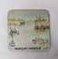 A square coaster with rounded corners featuring a watercolour painting printed of Newquay Harbour in Cornwall on a white background 