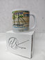 A white ceramic mug featuring a watercolour painting of Charlestown harbour in cornwall by artist R Singleton - reproduced in tribute by his daughter exclusively at HLSdesigner onto accessories and collectable prints. Focusing on the tall ships moored against the quay wall and the fishing village in the background, positioned onto a HLSdesigner branded mug box on a white background