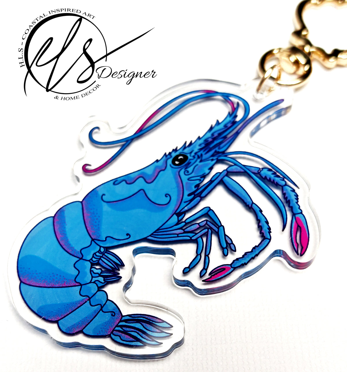 blue king shrimp close up photography image of a shrimp illustrated and printed onto an acrylic keychain with a seashell shaped clap in gold metal. perfect for decorating keys and accessories. HLSdesigner coastal inspired art and home décor 