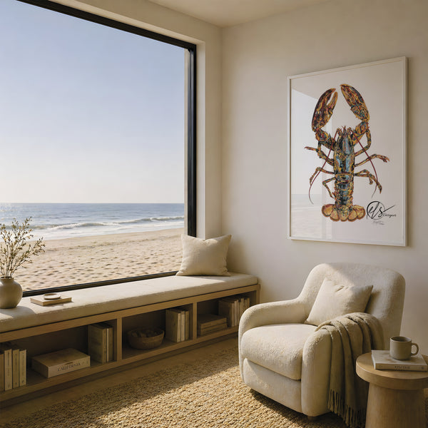 A framed lobster art print hangs on a beige wall in a bright, modern beach-view room with a window seat, cream armchair, and ocean view. Lobster fine art print features a beautiful range of oranges, blues, blacks and shading to create a 3d realistic lobster in its raw natural form. size not to scale, please see sizing for measurements of available prints. designed by Hannah at HLSdesigner in Cornwall