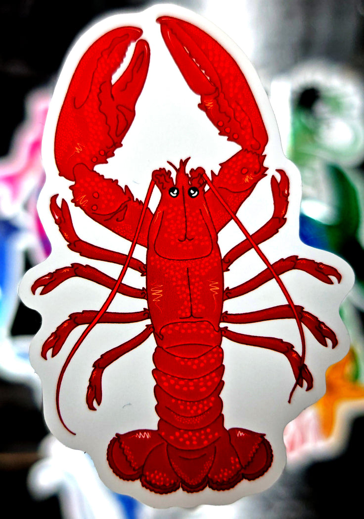bright exposure style image showcasing a lobster illustration in a die cut sticker form with a blurred background