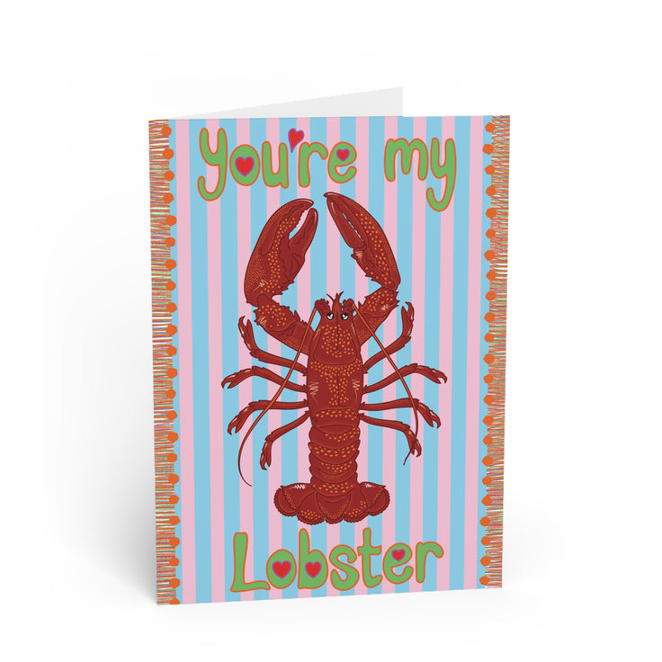 you're my lobster greetings card featuring HLSdesigner illustrations on a red and orange lobster with adorable loving eyes, green bubble text with heart centres and a blue and pale pink striped background with an orange tassel effect on each side, ocean inspired pun greetings cards designed and made by HLSdesigner