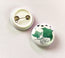 Button badge with greeny blue manta rays design on a white background