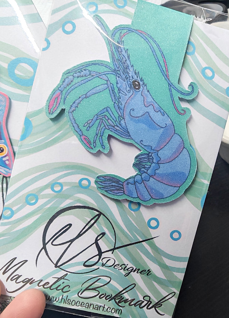 Magnetic bookmark with a blue king shrimp design on a wavy line pattern backing card handmade by HLSdesigner