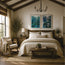 A styled bedroom interior with a bed dressed in cream bedding, two framed abstract blue-green wall art prints above the headboard, a wooden rocking chair by a window, bedside tables with lamps, and a bench at the foot of the bed. These fine art prints feature tranquil hues and moonlit waters, two reproductions of original acrylic paintings by Hannah Singleton, a fine artist based in Cornwall inspired by close up focal points of reflections on water and the ocean surface. Exclusive to HLSdesigner