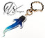 Blue shark-shaped keychain with gold ring on a white background, featuring Hills Coastal Inspired Art logo. constellation inspired whale shark illustration with spots, linear work and stars