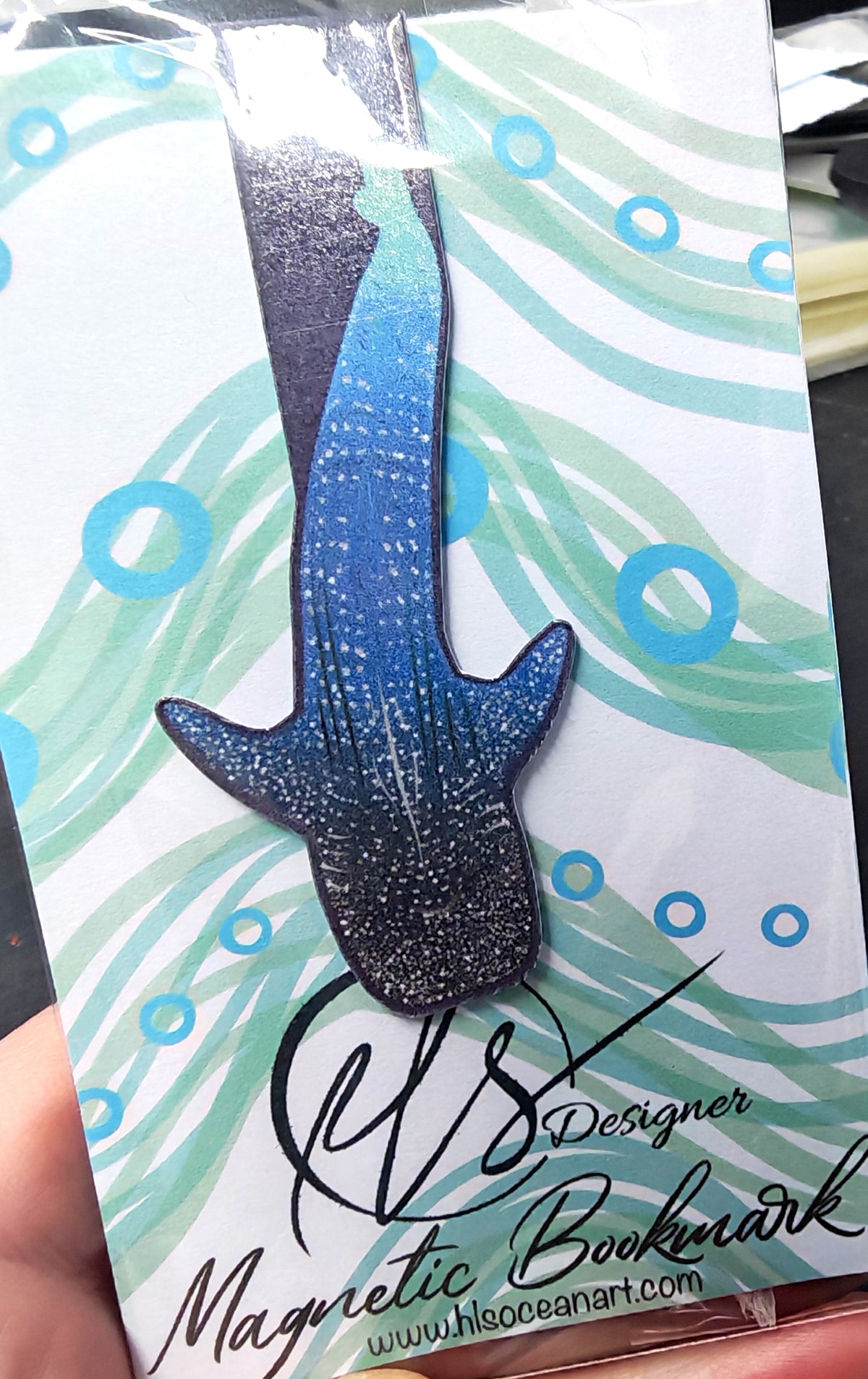 Magnetic bookmark with whale shark design on a branded HLSdesigner card