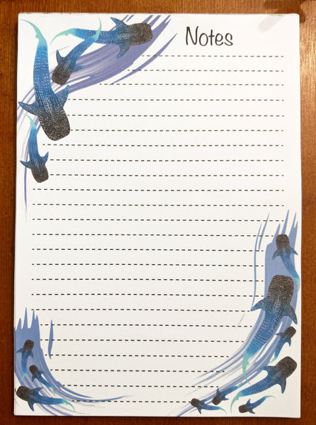 white notepad with dotted lines for note making, handmade and designed with the HLSdesigner whale shark illustrations swimming around the page 