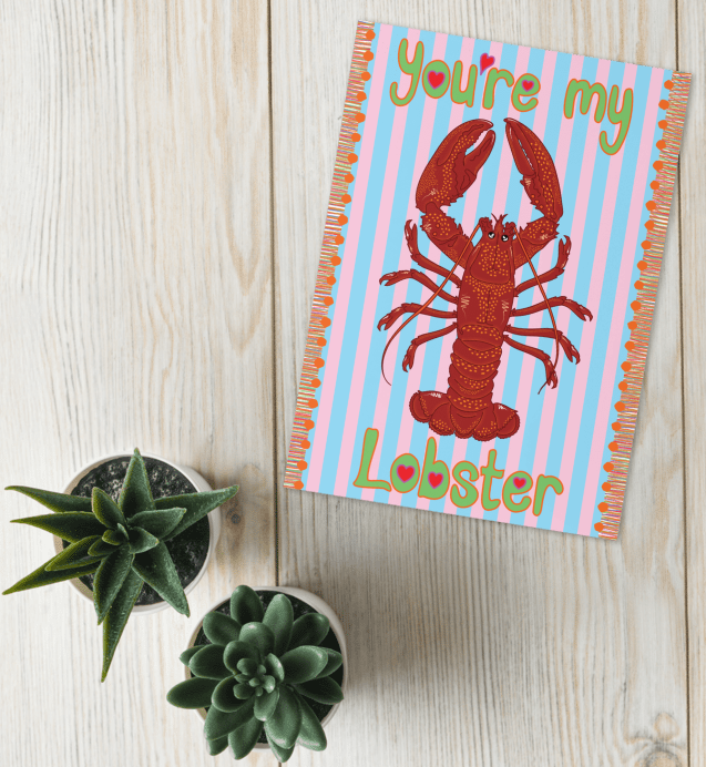 you're my lobster greetings card featuring HLSdesigner illustrations on a red and orange lobster with adorable loving eyes, green bubble text with heart centres and a blue and pale pink striped background with an orange tassel effect on each side, ocean inspired pun greetings cards designed and made by HLSdesigner